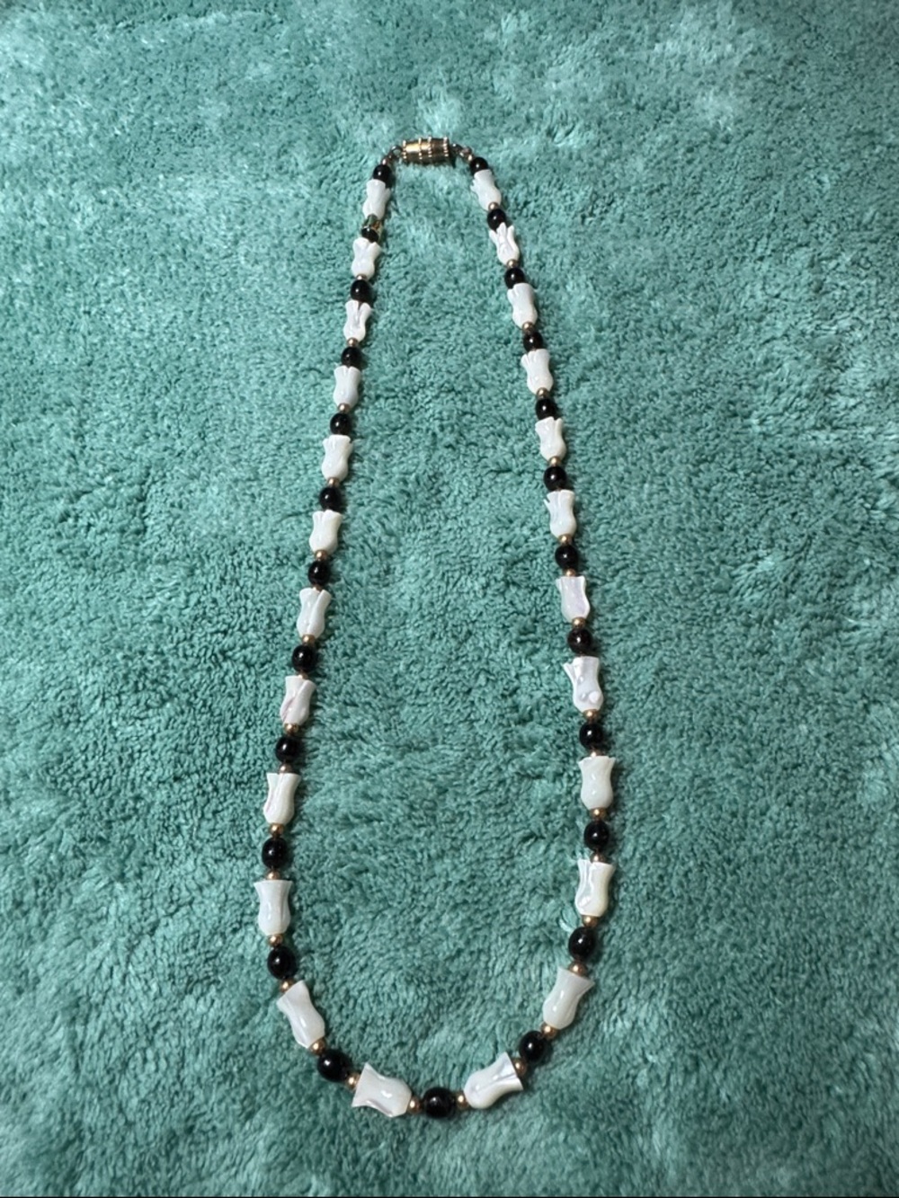 Mother of Pearl Beaded 14” Necklace with black beads featuring a barrel clasp.